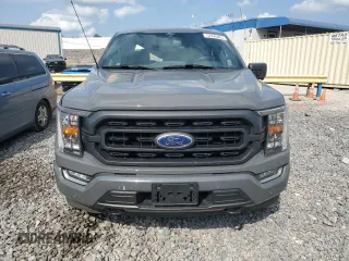 2021 Ford F-150 XL with VIN 1FTFW1E8XMFC22903, listed as a Copart auction lot 57840855 with 66,127 mi miles and Salvage title. Bid and sale history available at DreamBid. Image 5.