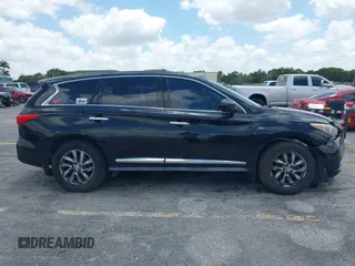 2015 Infiniti QX60 with VIN 5N1AL0MNXFC511350, listed as a IAAI auction lot 42117809 with 128,274 mi miles and . Bid and sale history available at DreamBid. Image 13.