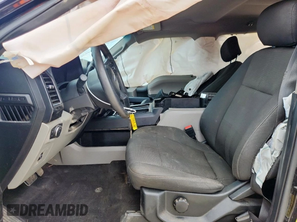 2018 Ford F-150 XL with VIN 1FTEW1E57JFC39493, listed as a Copart auction lot 61781395 with 129,871 mi miles and Salvage title. Bid and sale history available at DreamBid. Image 7.