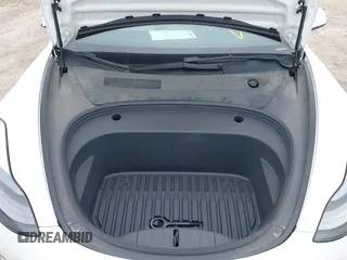 2022 Tesla Model 3 Long Range z VIN 5YJ3E1EB7NF241075, wystawiony jako IAAI lot #42217269 z przebiegiem 28 856 mil mil oraz . Historia ofert i sprzedaży dostępna na DreamBid. Obrazek 10.