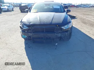 2020 Ford Fusion SE with VIN 3FA6P0LU1LR134904, listed as a IAAI auction lot 41448356 with 84,459 mi miles and . Bid and sale history available at DreamBid. Image 6.