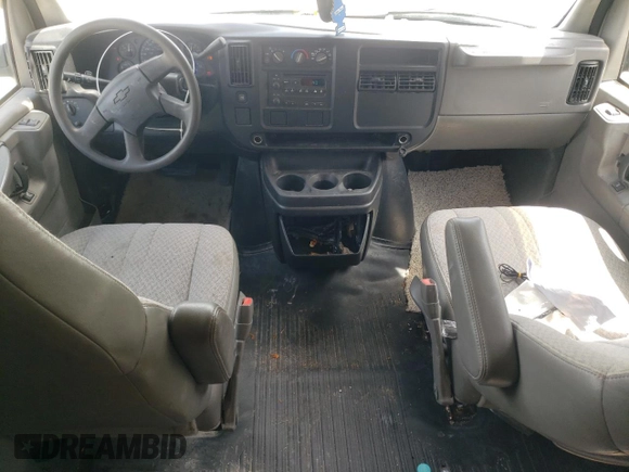 2005 Chevrolet Express Cargo with VIN 1GCFG15T051142218, listed as a Copart auction lot 57409005 with 185,725 mi miles and Salvage title. Bid and sale history available at DreamBid. Image 8.