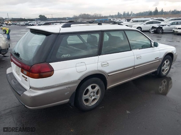 1999 Subaru Legacy Wagon Outback with VIN 4S3BG6852X7659898, listed as a IAAI auction lot 41298823 with 138,834 mi miles. Bid and sale history available at carsss.com. Image 4.