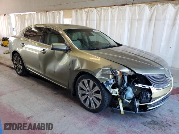 2013 Lincoln MKS EcoBoost with VIN 1LNHL9FT2DG604657, listed as a Copart auction lot 65357735 with 133,548 mi miles and Salvage title. Bid and sale history available at DreamBid. Image 4.