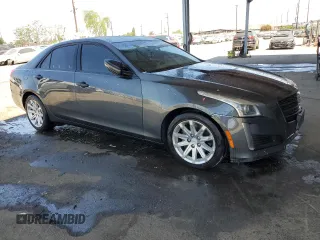 2015 Cadillac CTS Luxury RWD z VIN 1G6AR5SX1F0107989, wystawiony jako Copart lot #56432235 z przebiegiem 141 556 mil mil oraz Szkoda całkowita • Salvage title. Historia ofert i sprzedaży dostępna na DreamBid. Obrazek 4.