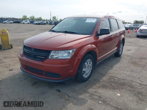 2014 Dodge Journey SE with VIN 3C4PDCAB8ET136794, listed as a IAAI auction lot 41986986 with 142,080 mi miles and . Bid and sale history available at DreamBid. Image 2.