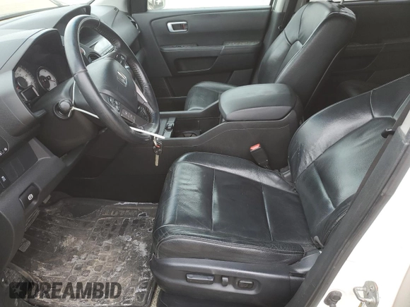2013 Honda Pilot Touring with VIN 5FNYF3H99DB007204, listed as a Copart auction lot 56891095 with 151,709 mi miles and Salvage title. Bid and sale history available at DreamBid. Image 7.