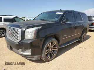 2015 GMC Yukon Denali z VIN 1GKS1CKJ6FR303712, wystawiony jako Copart lot #55927295 z przebiegiem 208 429 mil mil oraz Czysty tytuł • Clean title. Historia ofert i sprzedaży dostępna na DreamBid. Obrazek 1.