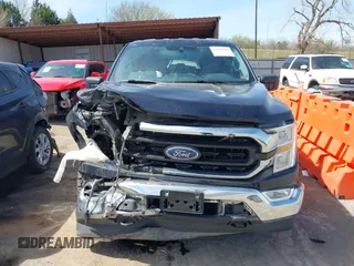 2021 Ford F-150 XL z VIN 1FTFW1E86MFB31305, wystawiony jako IAAI lot #41877501 z przebiegiem 140 285 mil mil oraz . Historia ofert i sprzedaży dostępna na DreamBid. Obrazek 13.