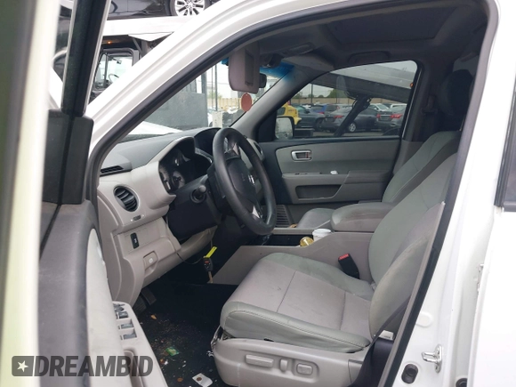 2015 Honda Pilot SE z VIN 5FNYF3H31FB005140, wystawiony jako IAAI lot #42081541 z przebiegiem 182 557 mil mil oraz . Historia ofert i sprzedaży dostępna na DreamBid. Obrazek 5.