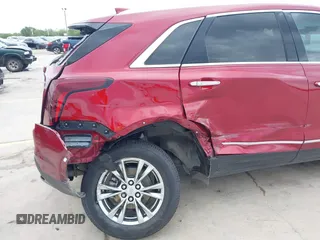 2020 Cadillac XT5 Premium Luxury FWD z VIN 1GYKNCRS8LZ228516, wystawiony jako IAAI lot #42409513 z przebiegiem 54 765 mil mil oraz . Historia ofert i sprzedaży dostępna na DreamBid. Obrazek 6.