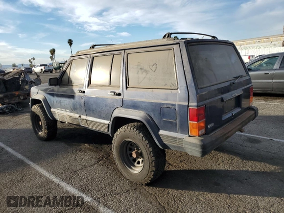 1996 Jeep Cherokee Sport with VIN 1J4FT68S4TL333342, listed as a Copart auction lot 41664965 with 185,199 mi miles and Clean Title. Bid and sale history available at carsss.com. Image 2.