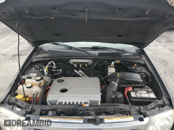 2011 Ford Escape Hybrid с VIN 1FMCU4K36BKB25314, выставлен на аукционе Copart как лот 60863695 с пробегом 165 013 миль миль и Списание • Salvage title. История ставок и продаж доступна на DreamBid. Изображение 12.