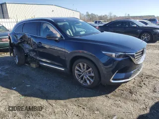 2021 Mazda CX-9 Carbon Edition with VIN JM3TCBDY1M0508409, listed as a Copart auction lot 83419844 with 88,647 mi miles and Salvage title. Bid and sale history available at DreamBid. Image 4.