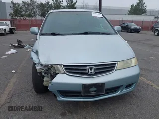 2003 Honda Odyssey EX-L with VIN 5FNRL18943B138444, listed as a IAAI auction lot 41498605 with 153,947 mi miles and . Bid and sale history available at DreamBid. Image 6.