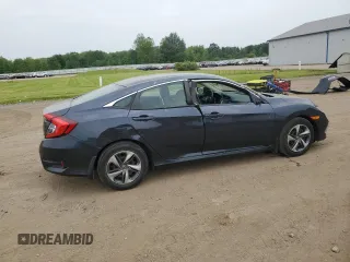 2020 Honda Civic LX with VIN 19XFC2F69LE025564, listed as a Copart auction lot 60811565 with 12,480 mi miles and Salvage title. Bid and sale history available at DreamBid. Image 3.
