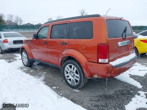 2007 Dodge Nitro SLT with VIN 1D8GU58K67W729201, listed as a IAAI auction lot 41601632 with 167,432 mi miles. Bid and sale history available at carsss.com. Image 3.