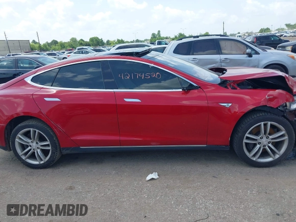 2014 Tesla Model S 60 with VIN 5YJSA1H14EFP63897, listed as a IAAI auction lot 42713272 with Not provided miles and . Bid and sale history available at DreamBid. Image 12.