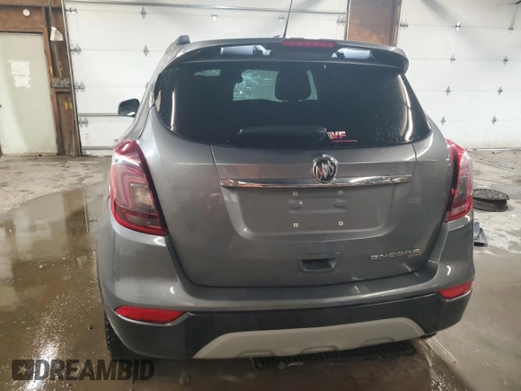 2019 Buick Encore Sport Touring with VIN KL4CJ2SB6KB927719, listed as a Copart auction lot 50040595 with 57,555 mi miles and Salvage Title. Bid and sale history available at DreamBid. Image 6.