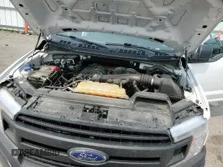 2020 Ford F-150 XL с VIN 1FTEW1EB7LFC10343, выставлен на аукционе Copart как лот 59022485 с пробегом 92 470 миль миль и Списание • Salvage title. История ставок и продаж доступна на DreamBid. Изображение 15.