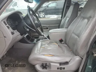 2000 Ford Explorer XLT z VIN 1FMDU83PXYZB03135, wystawiony jako Copart lot #45352705 z przebiegiem 228 604 mil mil oraz Szkoda całkowita • Salvage title. Historia ofert i sprzedaży dostępna na DreamBid. Obrazek 7.