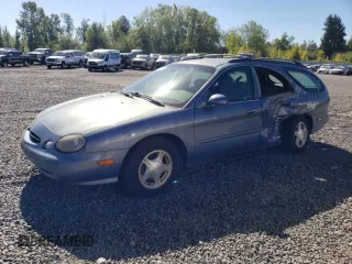 1999 Ford Taurus SE Standard with VIN 1FAFP58U9XG271897, listed as a Copart auction lot 73048784 with 190,518 mi miles and Salvage Title. Bid and sale history available at carsss.com. Image 1.