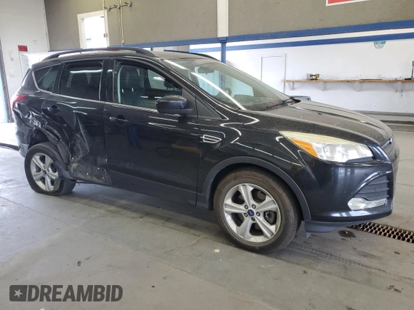 2013 Ford Escape SE with VIN 1FMCU9GX9DUA54240, listed as a Copart auction lot 60939035 with Not provided miles and Salvage title. Bid and sale history available at DreamBid. Image 4.