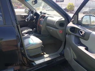 2006 Hyundai Santa Fe GLS with VIN KM8SC73EX6U047906, listed as a IAAI auction lot 42013780 with 200,828 mi miles. Bid and sale history available at carsss.com. Image 5.