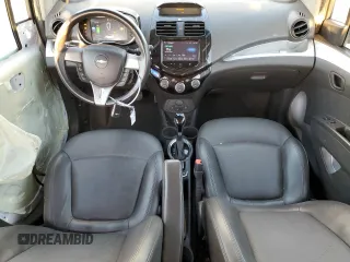 2016 Chevrolet Spark EV LT with VIN KL8CL6S00GC617212, listed as a Copart auction lot 84204304 with 61,059 mi miles and Salvage Title. Bid and sale history available at carsss.com. Image 8.