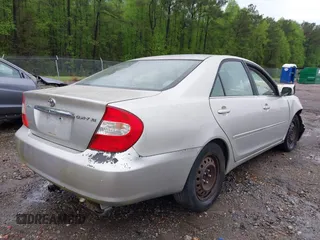 2003 Toyota Camry LE with VIN 4T1BE32K63U755835, listed as a IAAI auction lot 41976402 with 215,788 mi miles and . Bid and sale history available at DreamBid. Image 4.