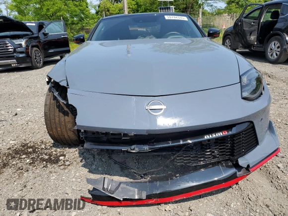 2024 Nissan Z Nismo с VIN JN1BZ4CH8RM363453, выставлен на аукционе Copart как лот 59744335 с пробегом 123 миль миль и Списание • Salvage title. История ставок и продаж доступна на DreamBid. Изображение 5.