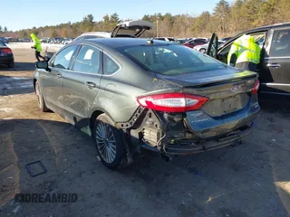 2015 Ford Fusion Titanium with VIN 3FA6P0D9XFR155040, listed as a IAAI auction lot 41423022 with 148,365 mi miles. Bid and sale history available at carsss.com. Image 3.