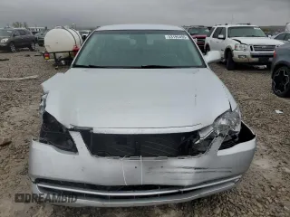2005 Toyota Avalon XL with VIN 4T1BK36B95U017744, listed as a Copart auction lot 53195495 with 144,173 mi miles and Salvage Title. Bid and sale history available at carsss.com. Image 5.