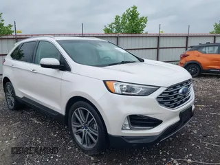 2019 Ford Edge Titanium z VIN 2FMPK3K98KBB92173, wystawiony jako IAAI lot #42270667 z przebiegiem 69 245 mil mil oraz . Historia ofert i sprzedaży dostępna na DreamBid. Obrazek 1.