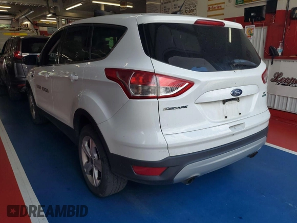 2013 Ford Escape SE with VIN 1FMCU9G92DUD72105, listed as a IAAI auction lot 42731657 with 213,477 mi miles and . Bid and sale history available at DreamBid. Image 5.