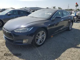 2014 Tesla Model S 60 z VIN 5YJSA1H17EFP33261, wystawiony jako Copart lot #58804465 z przebiegiem 147 583 mil mil oraz Czysty tytuł • Clean title. Historia ofert i sprzedaży dostępna na DreamBid. Obrazek 1.