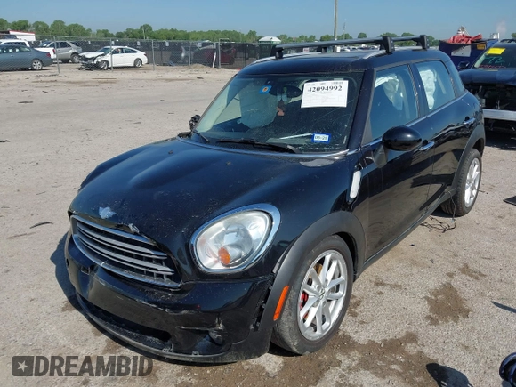 2015 MINI Countryman with VIN WMWZB3C54FWM33074, listed as a IAAI auction lot 42094992 with 86,704 mi miles and . Bid and sale history available at DreamBid. Image 18.
