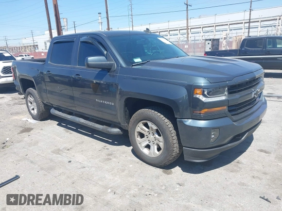 2018 Chevrolet Silverado 1500 LT with VIN 3GCUKREC1JG511846, listed as a IAAI auction lot 42024170 with 121,532 mi miles and . Bid and sale history available at DreamBid. Image 1.