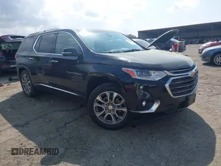 2020 Chevrolet Traverse Premier with VIN 1GNERKKW0LJ123828, listed as a IAAI auction lot 41947690 with 91,905 mi miles and . Bid and sale history available at DreamBid. Image 1.