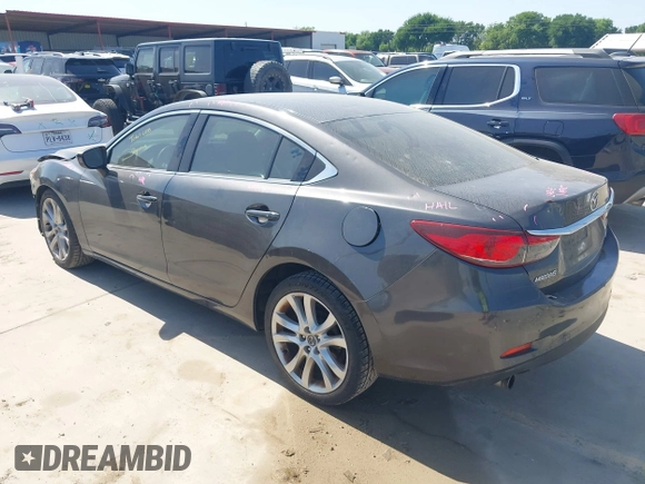 2014 Mazda 6 i Touring with VIN JM1GJ1V55E1105379, listed as a IAAI auction lot 42010585 with 153,870 mi miles and . Bid and sale history available at DreamBid. Image 3.