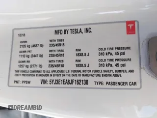 2018 Tesla Model 3 Long Range Battery z VIN 5YJ3E1EA8JF162130, wystawiony jako IAAI lot #41933015 z przebiegiem 50 081 mil mil oraz . Historia ofert i sprzedaży dostępna na DreamBid. Obrazek 9.