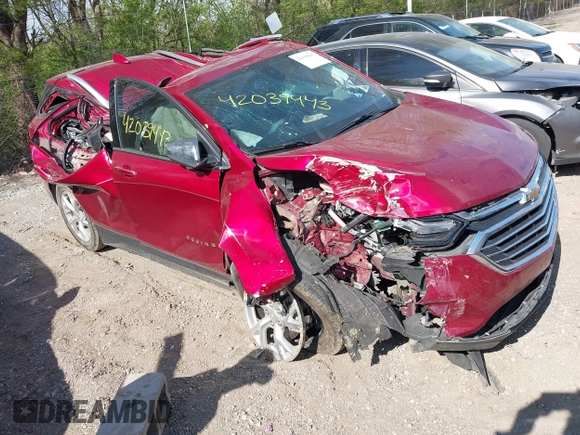 2021 Chevrolet Equinox Premier z VIN 2GNAXNEV7M6140889, wystawiony jako IAAI lot #42039443 z przebiegiem 101 767 mil mil oraz . Historia ofert i sprzedaży dostępna na DreamBid. Obrazek 1.