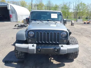 2015 Jeep Wrangler Unlimited Sport z VIN 1C4BJWDG6FL768265, wystawiony jako IAAI lot #42150124 z przebiegiem 85 108 mil mil oraz . Historia ofert i sprzedaży dostępna na DreamBid. Obrazek 12.
