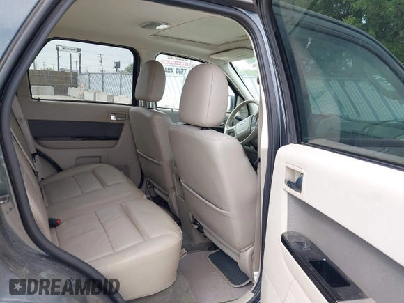 2009 Ford Escape Hybrid z VIN 1FMCU49319KC34926, wystawiony jako IAAI lot #42295564 z przebiegiem 125 648 mil mil oraz . Historia ofert i sprzedaży dostępna na DreamBid. Obrazek 8.