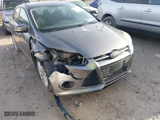 2012 Ford Focus Titanium with VIN 1FAHP3J2XCL421412, listed as a IAAI auction lot 41721565 with 117,632 mi miles. Bid and sale history available at carsss.com. Image 6.