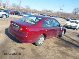 2003 Honda Civic LX with VIN 2HGES16503H573295, listed as a IAAI auction lot 41653528 with 55,866 mi miles and . Bid and sale history available at DreamBid. Image 4.