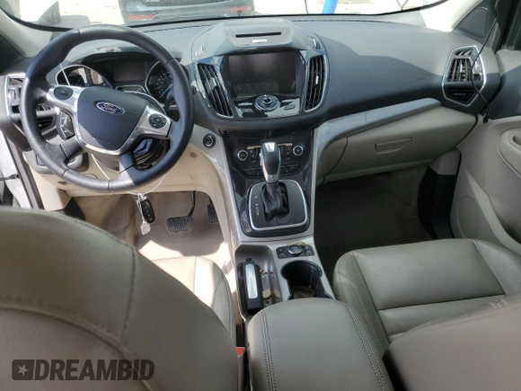 2013 Ford Escape SEL with VIN 1FMCU9H9XDUB08144, listed as a Copart auction lot 52887545 with 142,451 mi miles and Salvage Title. Bid and sale history available at DreamBid. Image 8.