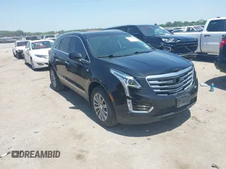 2019 Cadillac XT5 Luxury FWD with VIN 1GYKNCRS7KZ119625, listed as a IAAI auction lot 42258122 with 104,828 mi miles and . Bid and sale history available at DreamBid. Image 1.