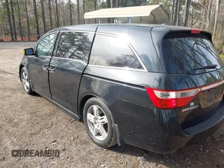 2013 Honda Odyssey Touring with VIN 5FNRL5H96DB003796, listed as a IAAI auction lot 41828376 with 6,308 mi miles and . Bid and sale history available at carsss.com. Image 3.
