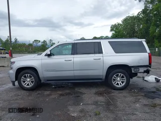 2016 Chevrolet Suburban LT z VIN 1GNSCHKCXGR111027, wystawiony jako IAAI lot #42399887 z przebiegiem 133 970 mil mil oraz . Historia ofert i sprzedaży dostępna na DreamBid. Obrazek 15.